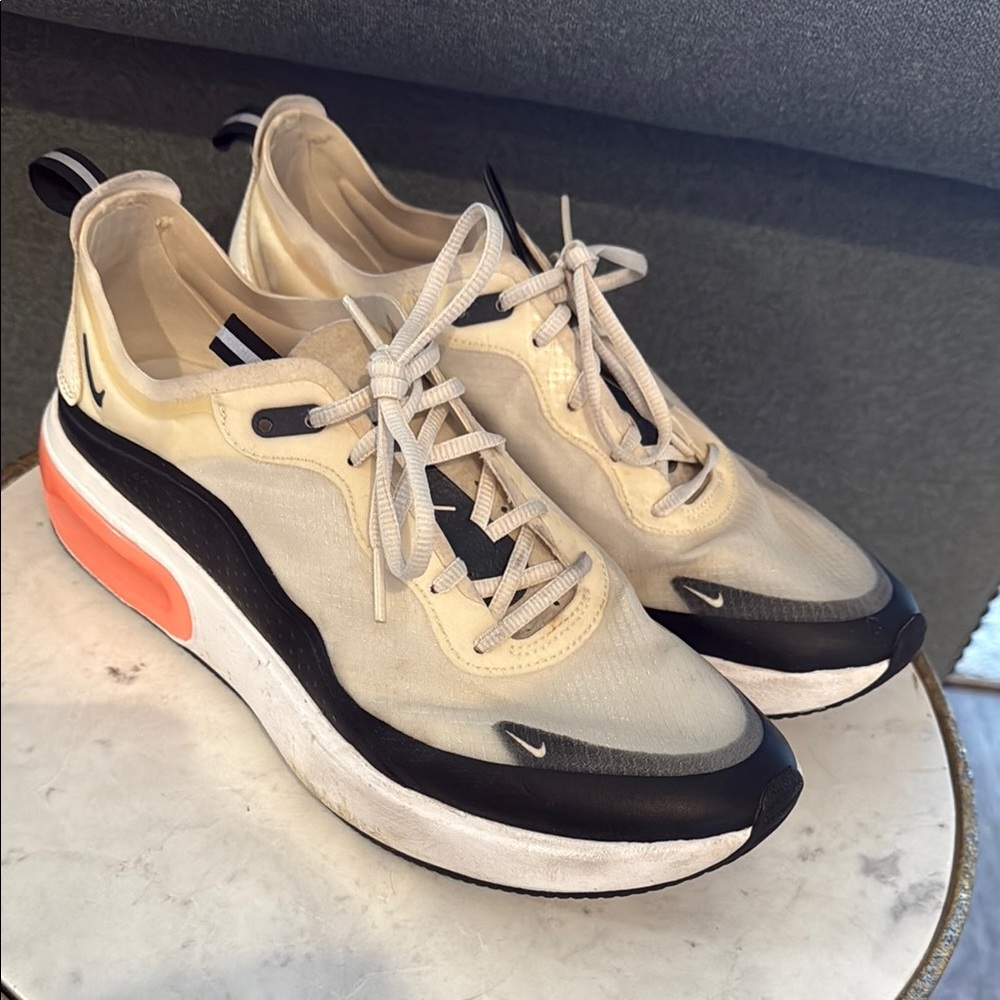 Cream and Black Nike